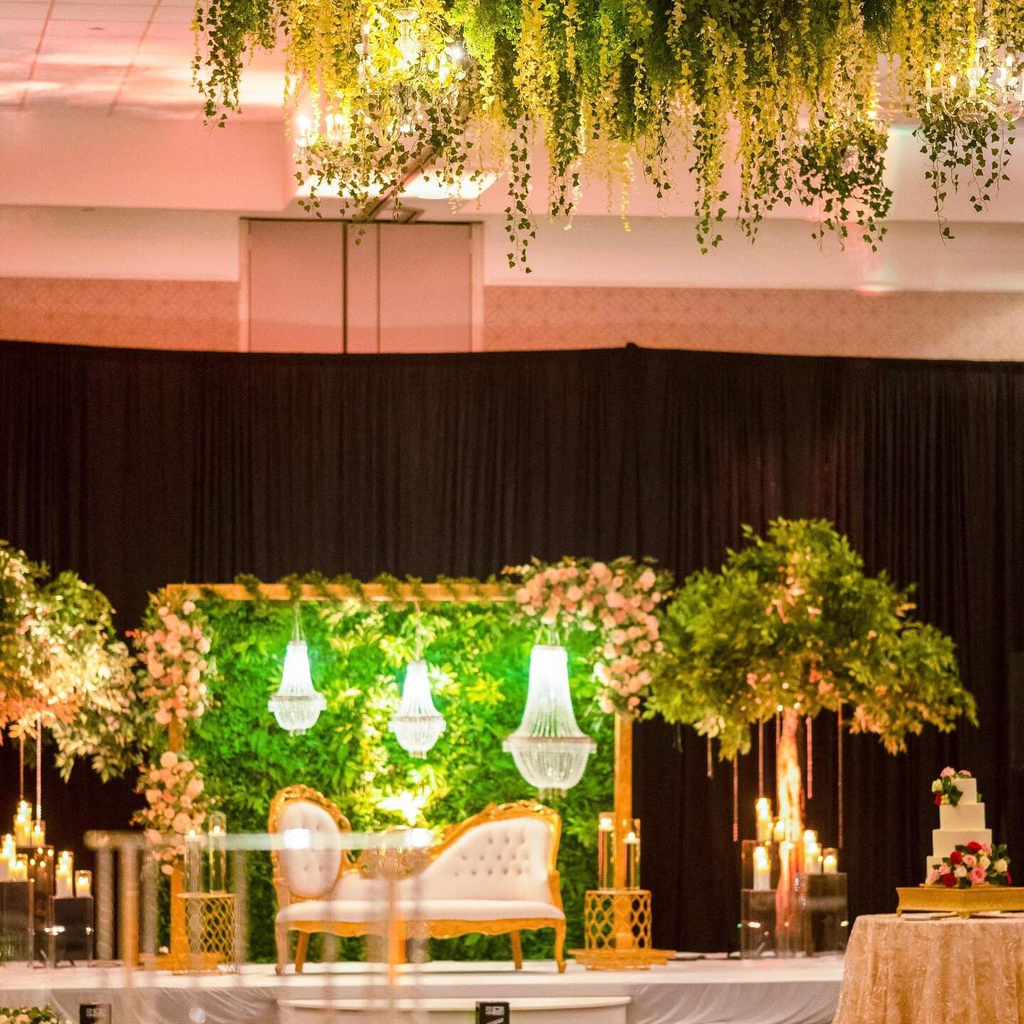 greenery floral backdrop at wedding reception